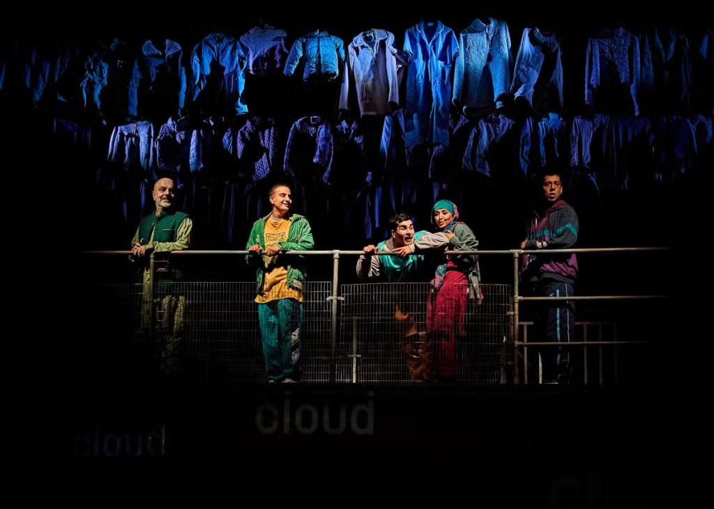 Image source: https://www.google.com/url?sa=i&url=https%3A%2F%2Fwww.standard.co.uk%2Fculture%2Ftheatre%2Fthe-boy-with-two-hearts-national-theatre-review-b1030608.html&psig=AOvVaw13pOfV3-hSL_HuThGq2nXK&ust=1708260448252000&source=images&cd=vfe&opi=89978449&ved=0CBUQjhxqFwoTCOjtjpu0soQDFQAAAAAdAAAAABAd